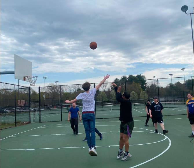 TPA student playing basketball